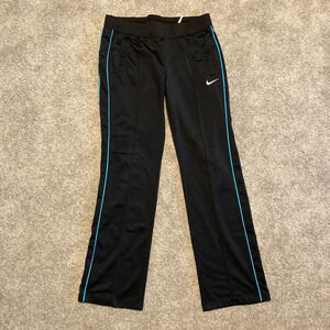 GUC Nike Track Pants Women’s size Medium. Black with blue stripe Fleece Lined